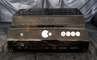 Illustration for article titled Super Genintari 4-in-1 Console Jams Nintendo, SEGA, and Atari